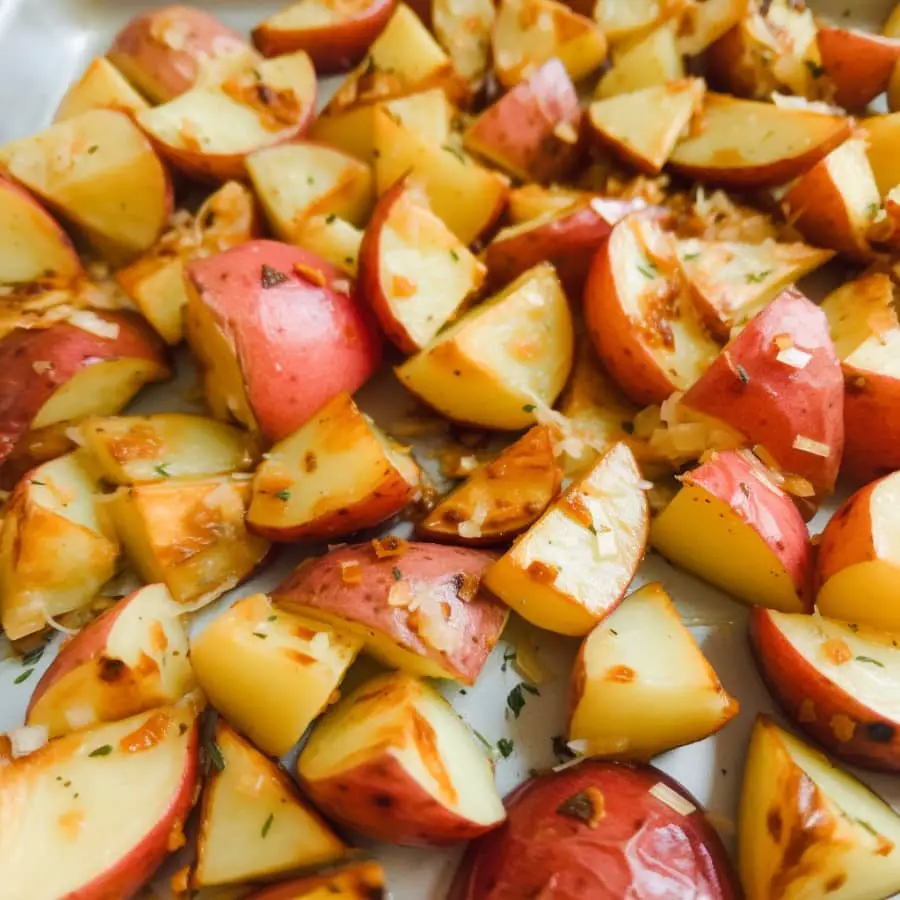 closeup of onion soup roasted potatoes on baking sheet
